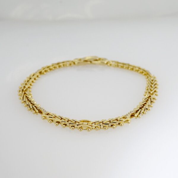 Brazalete de Acero Bañado en Oro 14k - BR034